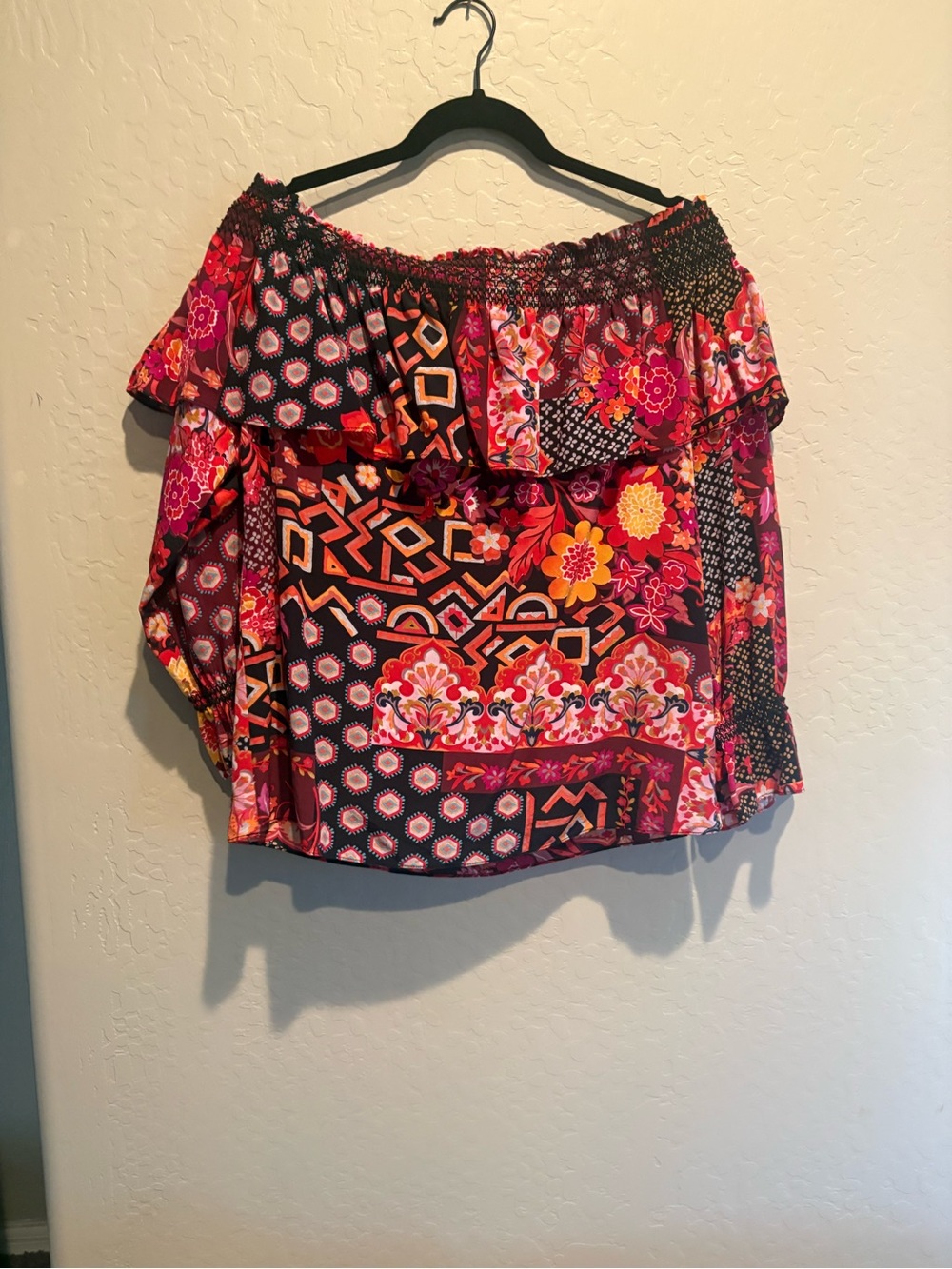 Trina Turk Off-Shoulder Floral Geo Patchwork Top in Pink and Black